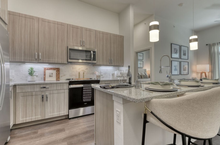 Modern kitchen with island and stainless steel appliances