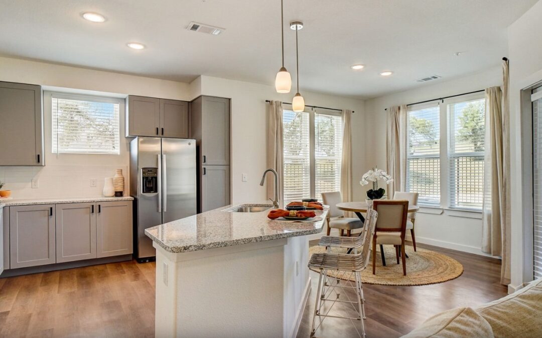 Gourmet kitchen featuring granite countertops and custom espresso cabinetry.