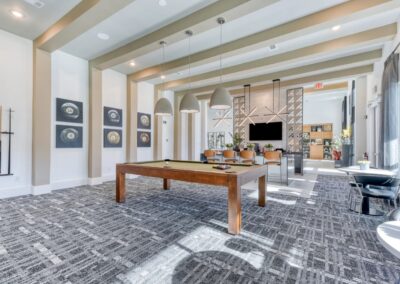 Sophisticated community clubhouse with designer social lounge at SA1293 in San Antonio - Apartment Buddy