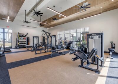 State-of-the-art 24-hour fitness center with professional-grade equipment at SA1352 in New Braunfels - Apartment Buddy