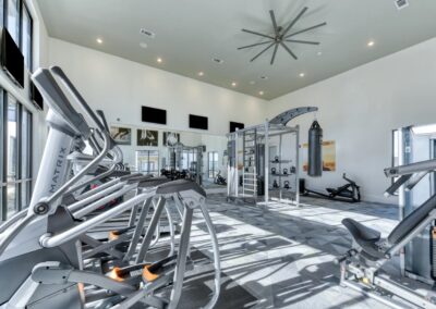State-of-the-art fitness center with premium cardio and strength equipment at SA1293 in San Antonio - Apartment Buddy