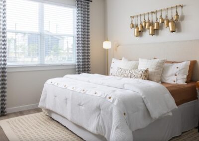 Spacious primary bedroom with large windows at SA1335 in New Braunfels - Apartment Buddy