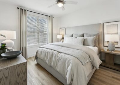 Luxury Master Suite with premium wide-plank flooring at SA1353 in New Braunfels - Apartment Buddy.
