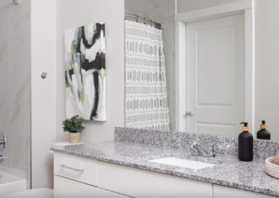 Spa-inspired bathroom with marble-style counters at SA1335 in New Braunfels - Apartment Buddy